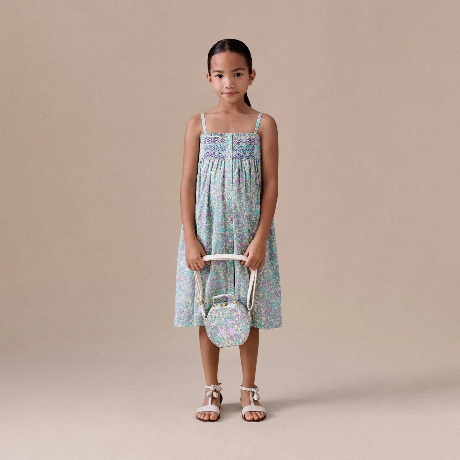 Bonpoint-Passion dress smocked and embroidered in Liberty fabric in organic cotton