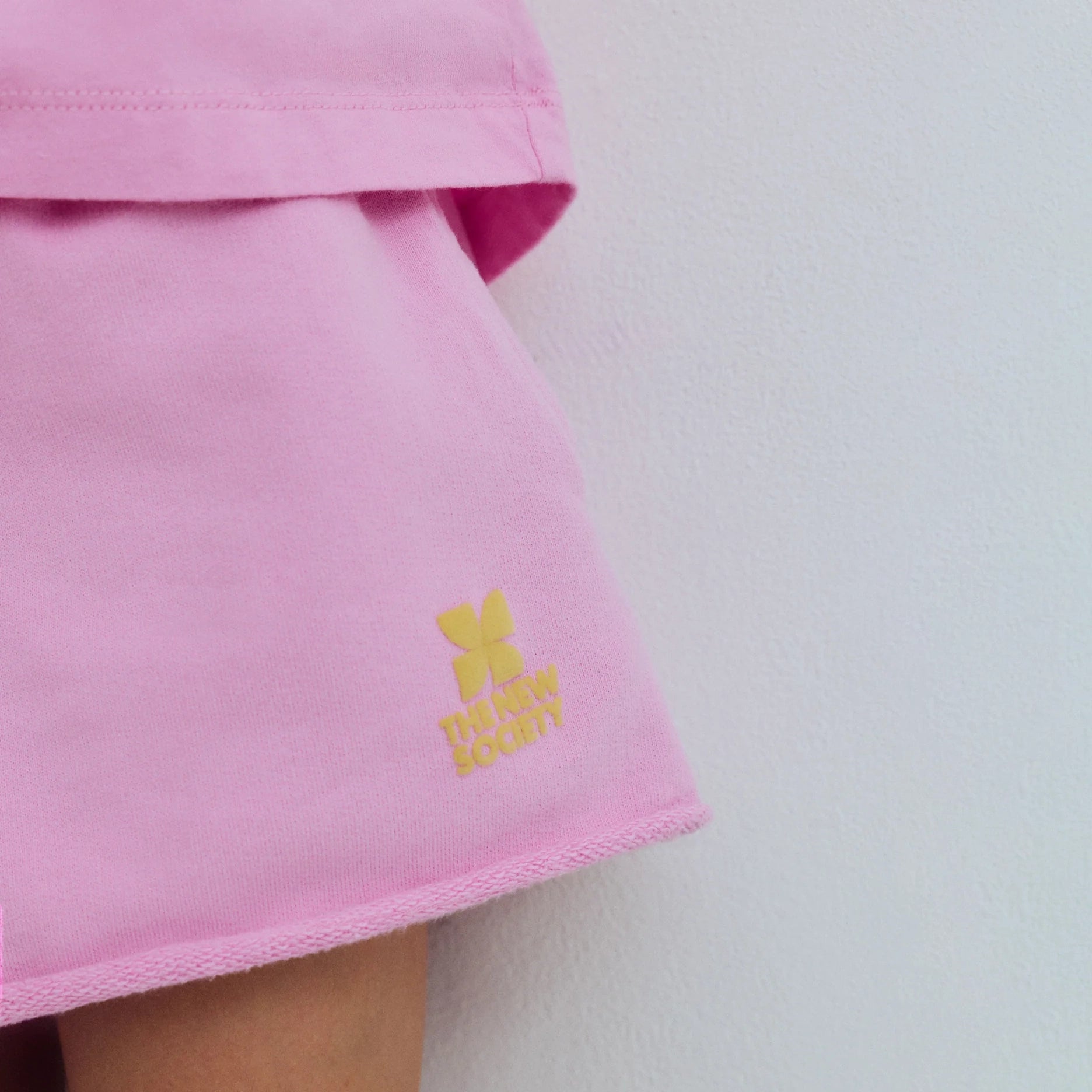 The New Society-TNS Logo Short Pink Lavander