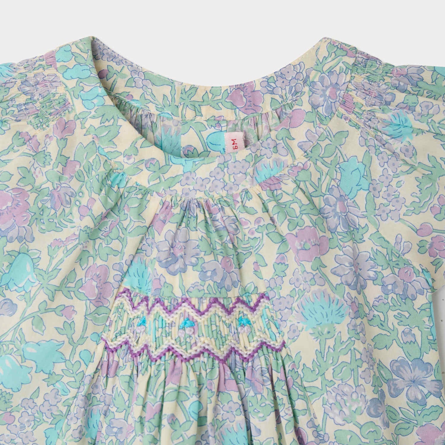 Bonpoint-Laurie blouse smocked and hand-embroidered in Liberty Parme Clair