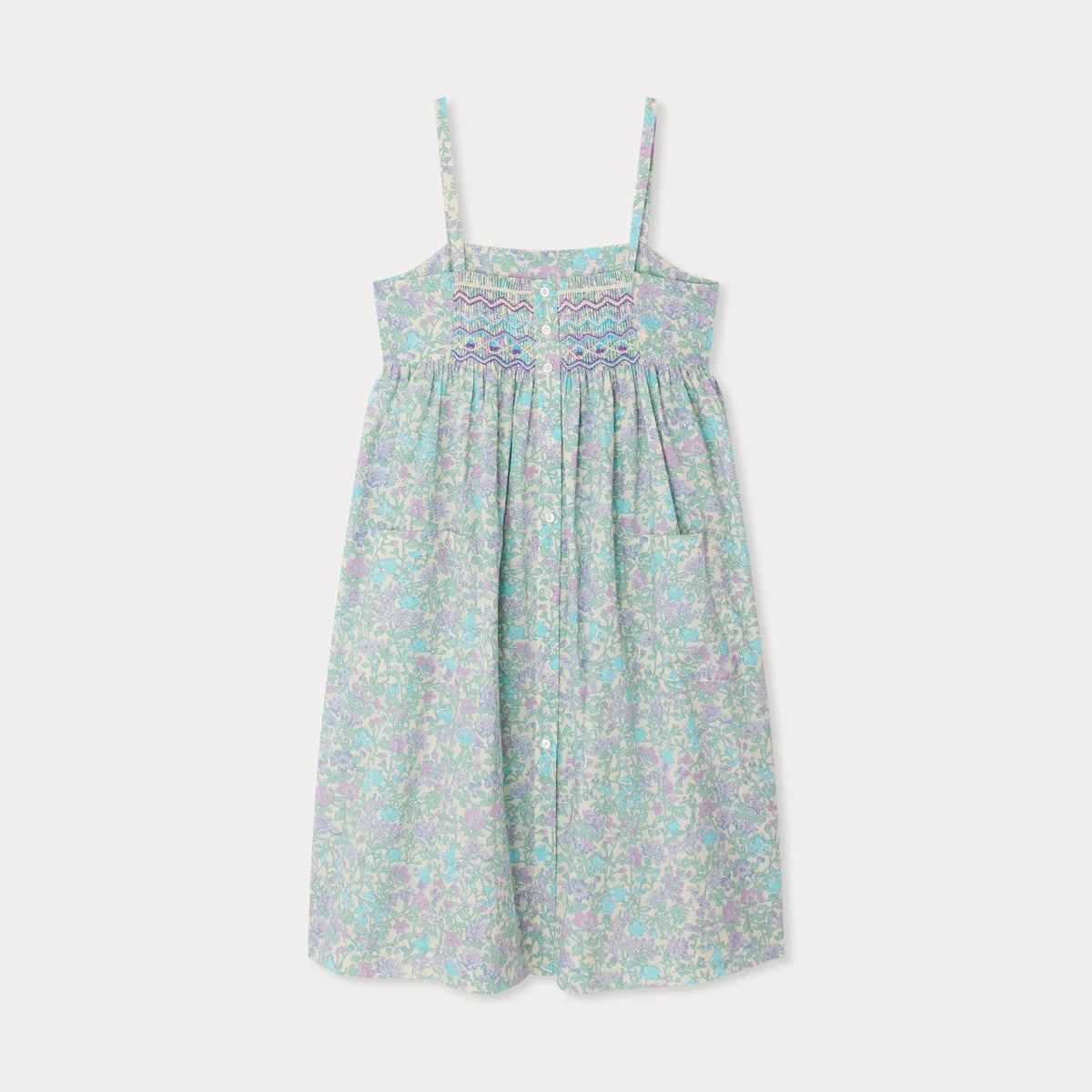 Bonpoint-Passion dress smocked and embroidered in Liberty fabric in organic cotton