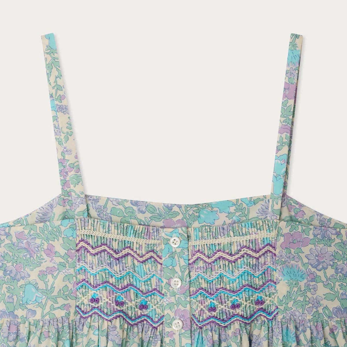 Bonpoint-Passion dress smocked and embroidered in Liberty fabric in organic cotton