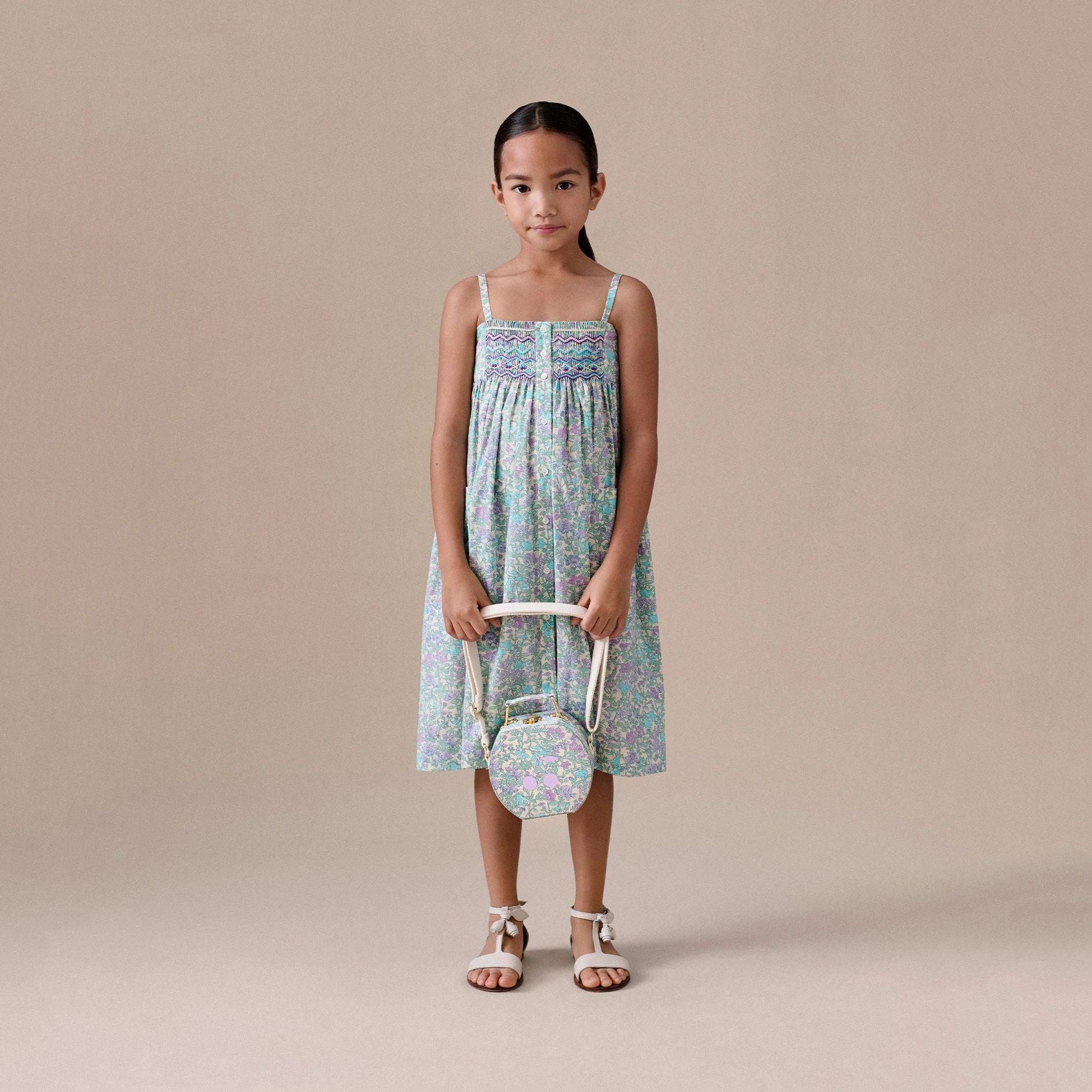 Bonpoint-Passion dress smocked and embroidered in Liberty fabric Parme Clair