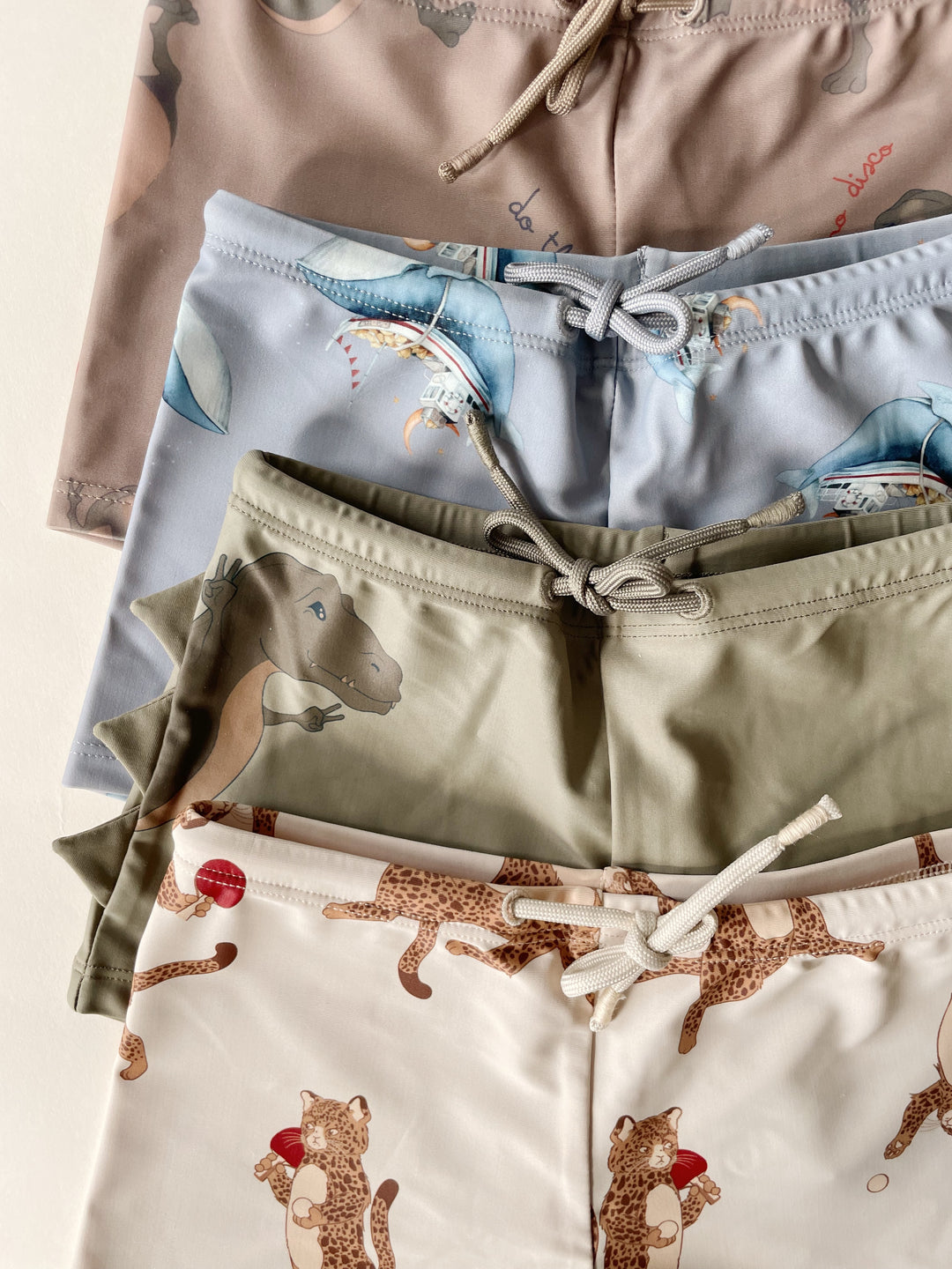 ASTER SWIM PANTS - DANSOSAURUS